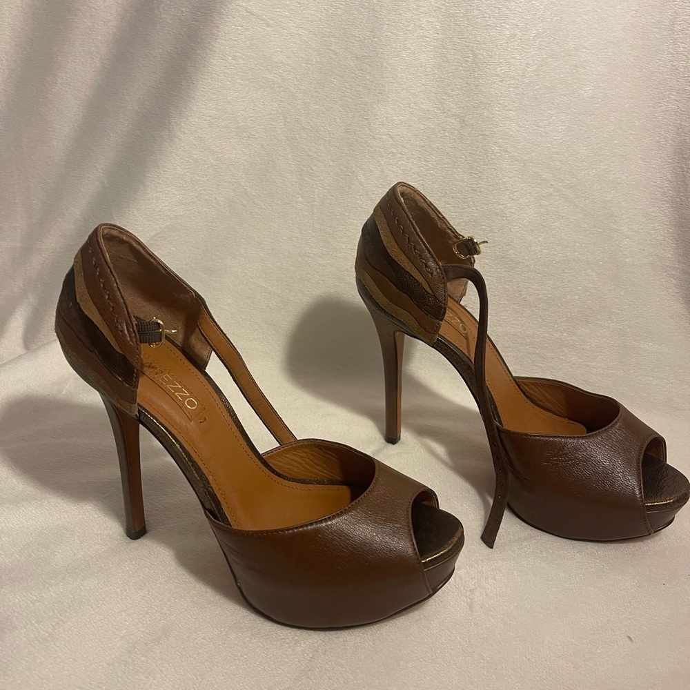 Brown leather platform sandal.